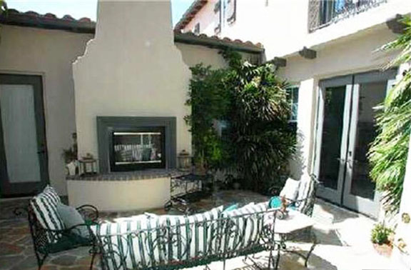 Valencia Woodlands Presidio Tract Plan 1courtyard with fireplace